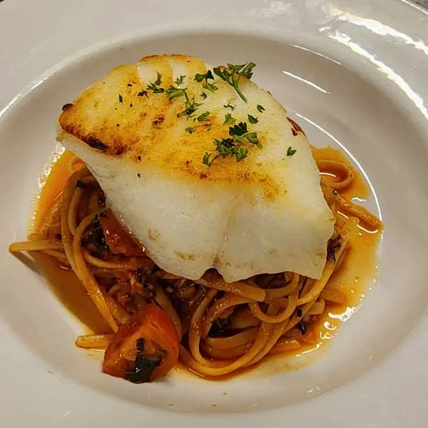 A grilled scallop over noodles — places to eat and drink in Northwest Illinois