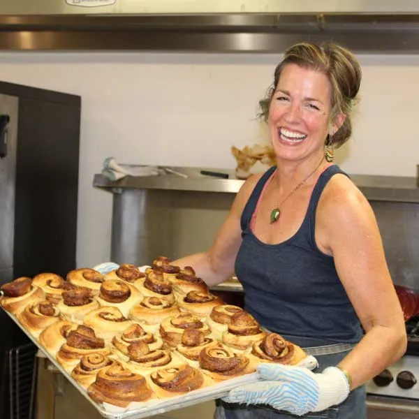 A tray of warm cinnamon rolls from a local bakery